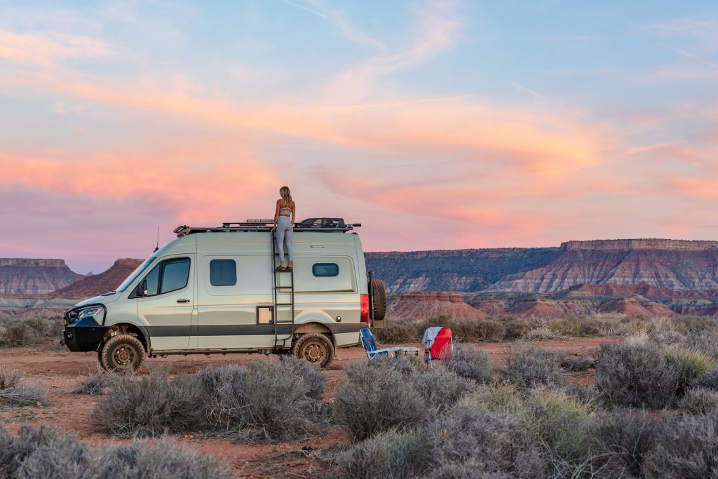 Standing on top of campervan